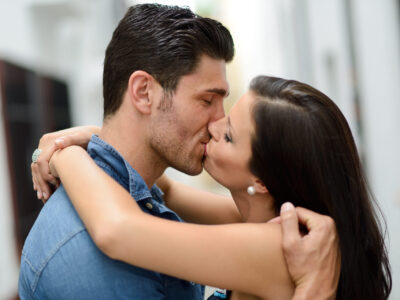 Young couple kissing in the street